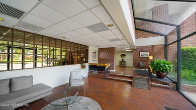 Breathtaking views from every angle! This remodeled top-floor - photo 4