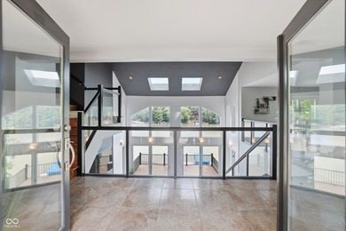 Positioned on 155' of waterfront in a deep-water cove, this - photo 5