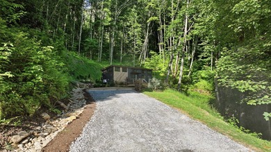 Perched on 1.12 private acres, this custom-built Timbercraft - photo 2