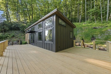 Perched on 1.12 private acres, this custom-built Timbercraft - photo 8