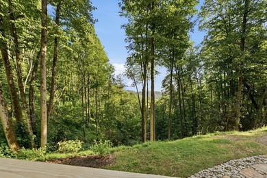 Perched on 1.12 private acres, this custom-built Timbercraft - photo 10