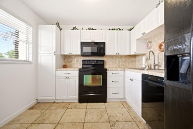 Beautifully maintained 2nd-floor 1-bedroom, 1.5-bath condo with - photo 4