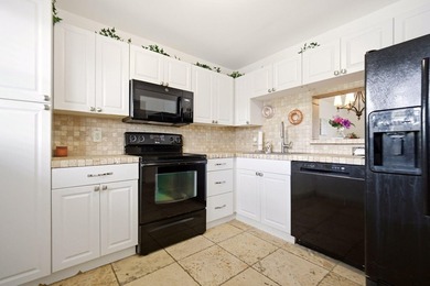 Beautifully maintained 2nd-floor 1-bedroom, 1.5-bath condo with - photo 5