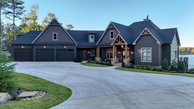 Custom-built home w/ breathtaking lake & mountain views. Open - photo 6