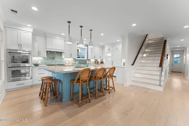 Welcome to this spectacularly 4-bedroom 4.5 bath custom built