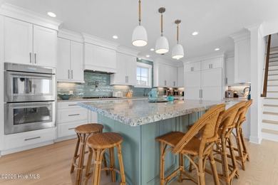 Welcome to this spectacularly 4-bedroom 4.5 bath custom built