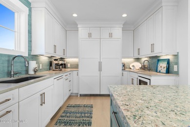 Welcome to this spectacularly 4-bedroom 4.5 bath custom built