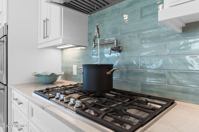 Welcome to this spectacularly 4-bedroom 4.5 bath custom built