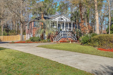 Nestled in a peaceful cul-de-sac within the gated Coosaw Creek - photo 3