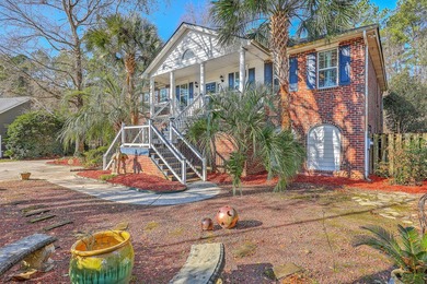 Nestled in a peaceful cul-de-sac within the gated Coosaw Creek - photo 5