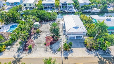 Oceanside canal-front home in the desirable Breezeswept Beach - photo 25