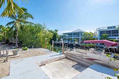 Oceanside canal-front home in the desirable Breezeswept Beach - photo 26