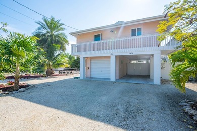 Oceanside canal-front home in the desirable Breezeswept Beach - photo 32