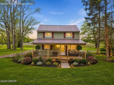 Peaceful setting on almost half an acre. This charming home - photo 4