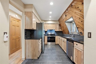 Enjoy lake-area living in this charming A-frame home located in - photo 9