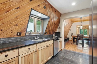 Enjoy lake-area living in this charming A-frame home located in - photo 10