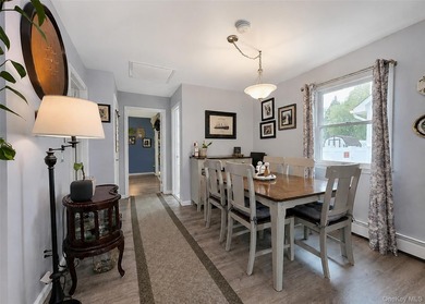 Spacious and open floor plan with cathedral ceilings welcome you - photo 6