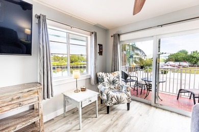 Wake up to waterfront balcony views, spend your days on the - photo 16