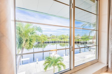 Wake up to waterfront balcony views, spend your days on the - photo 39