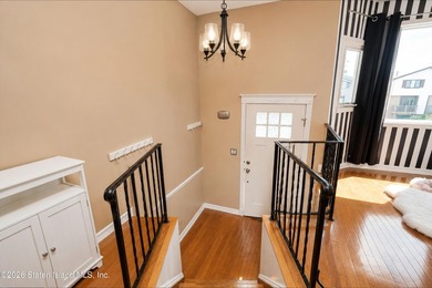 Welcome to this beautifully maintained semi-attached home in the - photo 3
