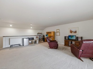 Set along a tranquil lake in Hampton Lakes at River Hall, this - photo 22
