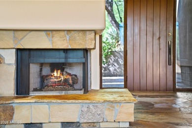 Tucked into a private Desert Mountain setting, this - photo 1