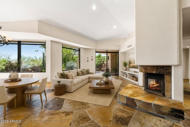 Tucked into a private Desert Mountain setting, this - photo 2