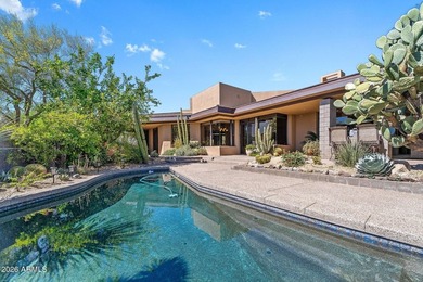Tucked into a private Desert Mountain setting, this - photo 5