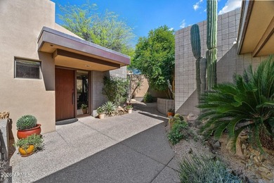 Tucked into a private Desert Mountain setting, this - photo 7