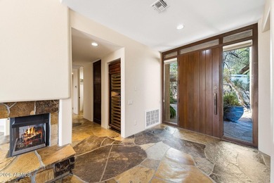 Tucked into a private Desert Mountain setting, this - photo 8