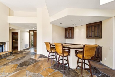 Tucked into a private Desert Mountain setting, this - photo 10