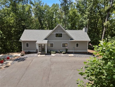 Experience exceptional lakefront living in this custom-built - photo 4
