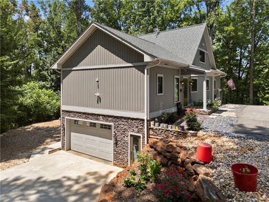 Experience exceptional lakefront living in this custom-built - photo 6