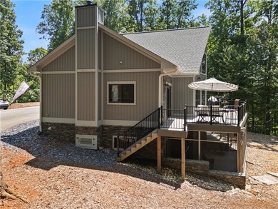 Experience exceptional lakefront living in this custom-built - photo 7