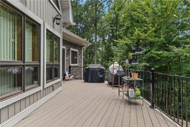 Experience exceptional lakefront living in this custom-built - photo 9