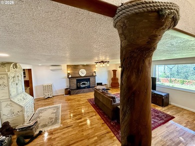 Take in the bay views while enjoying a blazing fire in this - photo 11