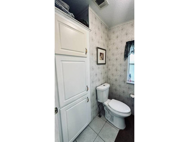 This charming 2-bedroom, 2-bathroom plus den mobile home offers - photo 12