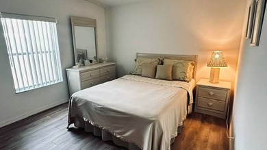This charming 2-bedroom, 2-bathroom plus den mobile home offers - photo 13