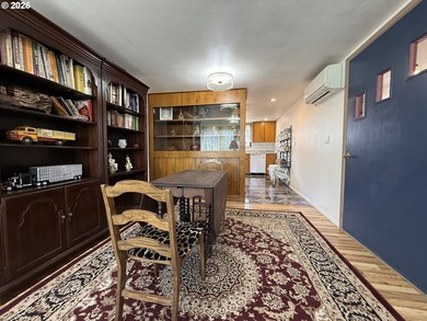 Take in the bay views while enjoying a blazing fire in this - photo 14