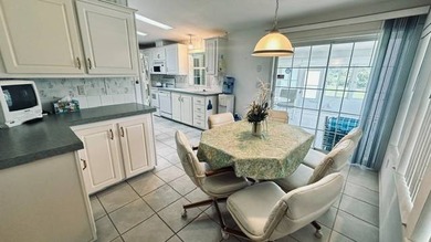 This charming 2-bedroom, 2-bathroom plus den mobile home offers - photo 16
