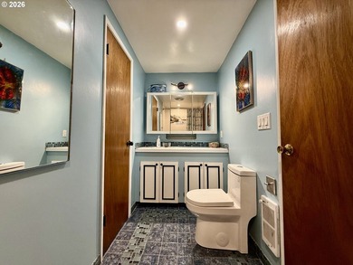 Take in the bay views while enjoying a blazing fire in this - photo 19