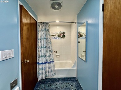 Take in the bay views while enjoying a blazing fire in this - photo 20