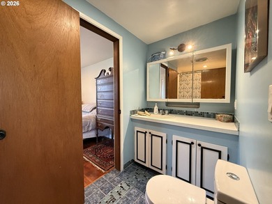 Take in the bay views while enjoying a blazing fire in this - photo 22