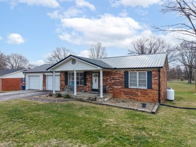 Welcome to this beautifully maintained brick ranch home - photo 3