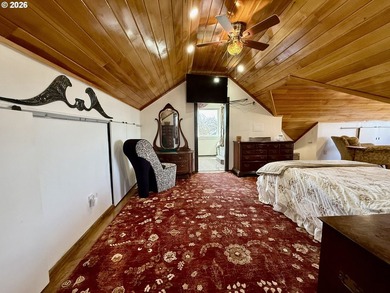 Take in the bay views while enjoying a blazing fire in this - photo 25