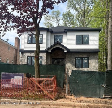 NEW CONSTRUCTION! Custom Two Family Center Hall Colonial located - photo 7