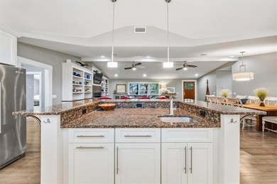 Set beneath a quiet canopy of live oaks, 636 Old Plantation Road - photo 28
