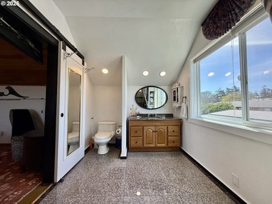 Take in the bay views while enjoying a blazing fire in this - photo 29