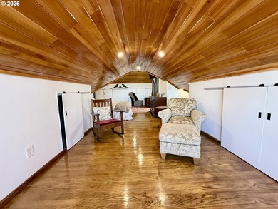 Take in the bay views while enjoying a blazing fire in this - photo 30