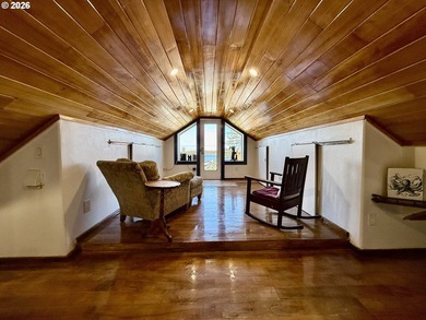 Take in the bay views while enjoying a blazing fire in this - photo 31